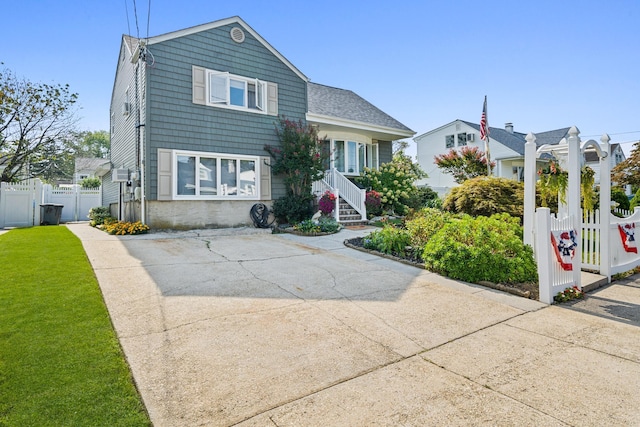 9 Duke St, North Babylon, NY 11703 - split level home featuring a gate