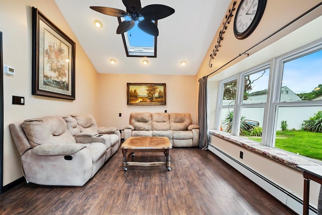 9 Duke St, North Babylon, NY 11703 - living area with a baseboard radiator, lofted ceiling, a ceiling fan, dark wood-type flooring, and a skylight