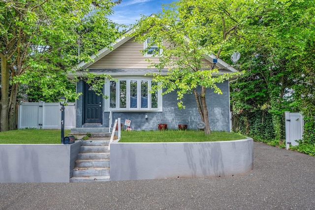 1 William St, Glen Cove, NY 11542 - view of front of property featuring a gate and brick siding