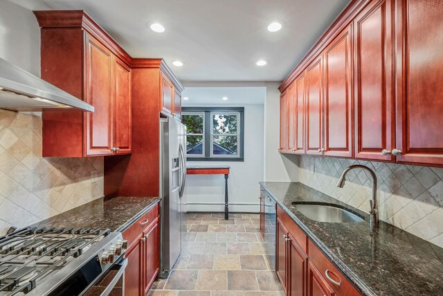 1 William St, Glen Cove, NY 11542 - kitchen featuring wall chimney exhaust hood, a sink, stainless steel appliances, dark brown cabinets, and recessed lighting