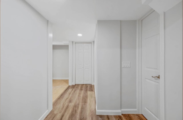 1 William St, Glen Cove, NY 11542 - hall with light wood finished floors, baseboards, and recessed lighting