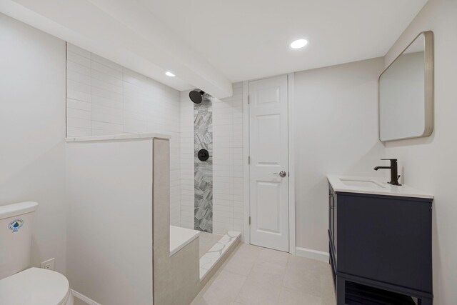 1 William St, Glen Cove, NY 11542 - bathroom featuring a walk in shower, vanity, toilet, recessed lighting, and tile patterned flooring