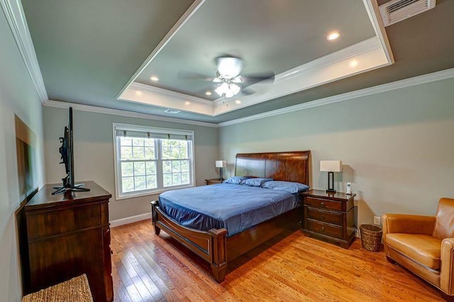 86 Manitou Trl, Kings Park, NY 11754 - bedroom featuring a raised ceiling, light wood-type flooring, crown molding, ceiling fan, and recessed lighting