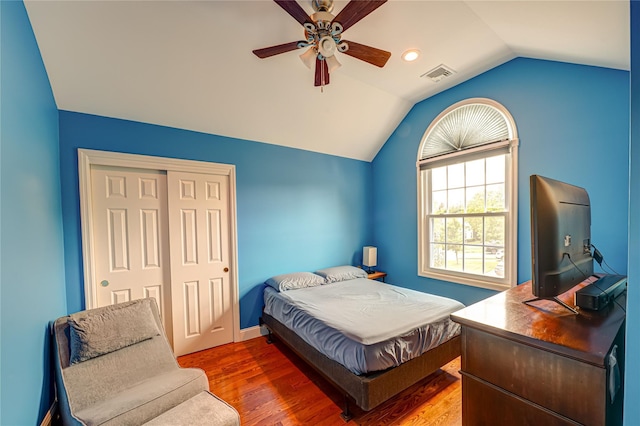 86 Manitou Trl, Kings Park, NY 11754 - bedroom featuring lofted ceiling, wood finished floors, a closet, ceiling fan, and baseboards