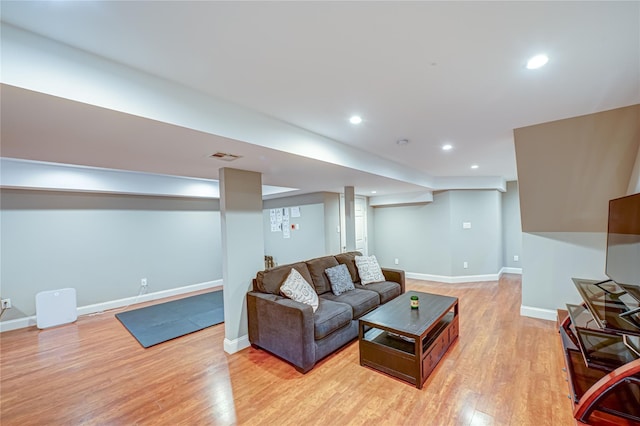 86 Manitou Trl, Kings Park, NY 11754 - living area with light wood finished floors, baseboards, and recessed lighting