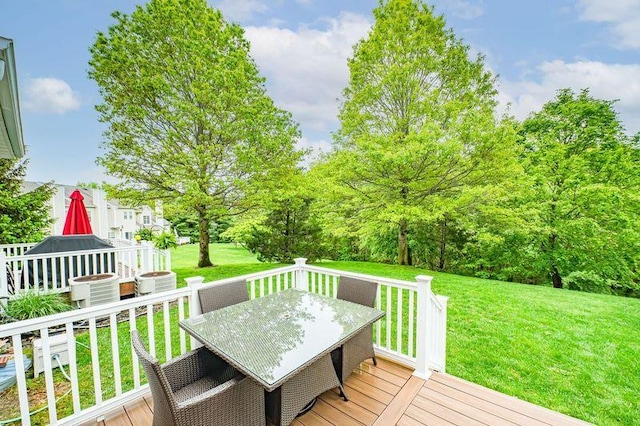 86 Manitou Trl, Kings Park, NY 11754 - wooden terrace featuring outdoor dining space, a yard, and central AC