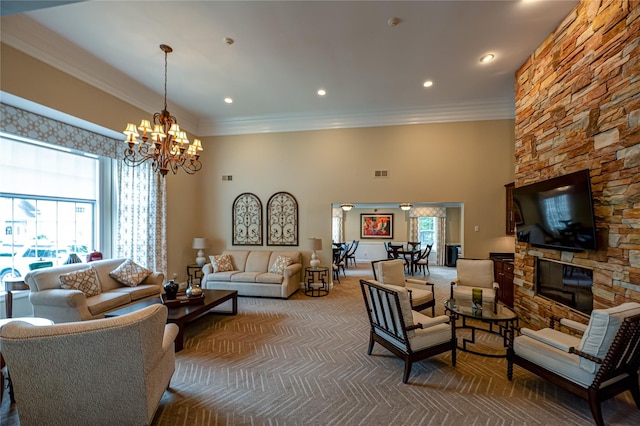 86 Manitou Trl, Kings Park, NY 11754 - living room with a chandelier, carpet floors, crown molding, recessed lighting, and a stone fireplace