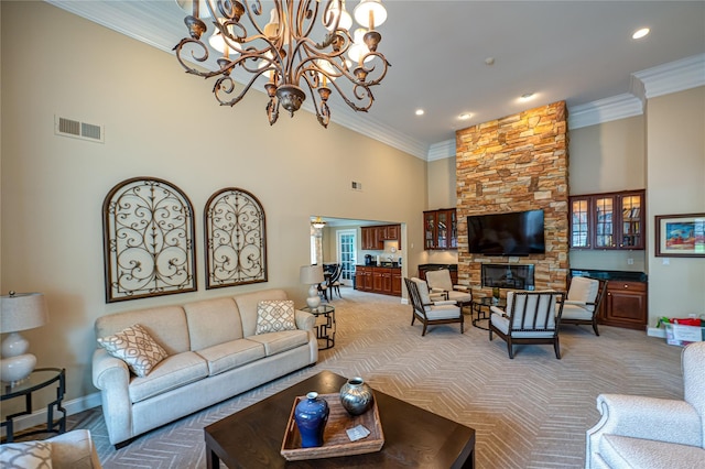 86 Manitou Trl, Kings Park, NY 11754 - living area with a chandelier, baseboards, light colored carpet, a high ceiling, and recessed lighting