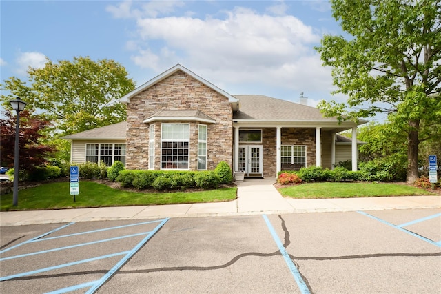 86 Manitou Trl, Kings Park, NY 11754 - view of building exterior with uncovered parking
