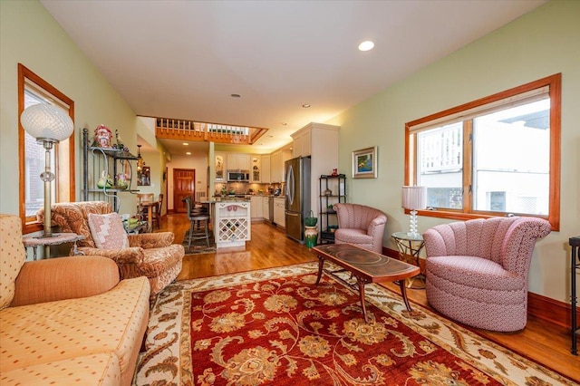991 W Park Ave, Long Beach, NY 11561 - living room with light wood-style floors and recessed lighting