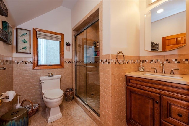 991 W Park Ave, Long Beach, NY 11561 - bathroom featuring tile walls, tile patterned flooring, vanity, a shower stall, and toilet