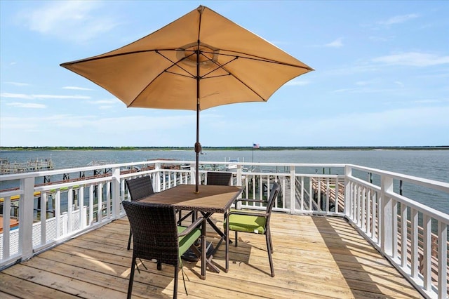 991 W Park Ave, Long Beach, NY 11561 - wooden terrace with a water view and outdoor dining space