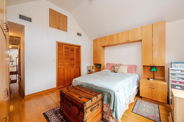 991 W Park Ave, Long Beach, NY 11561 - bedroom featuring high vaulted ceiling, light wood-style flooring, and a closet