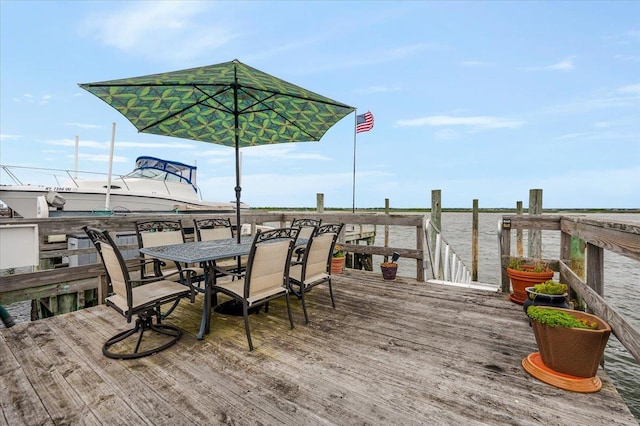 991 W Park Ave, Long Beach, NY 11561 - deck featuring outdoor dining space and a water view
