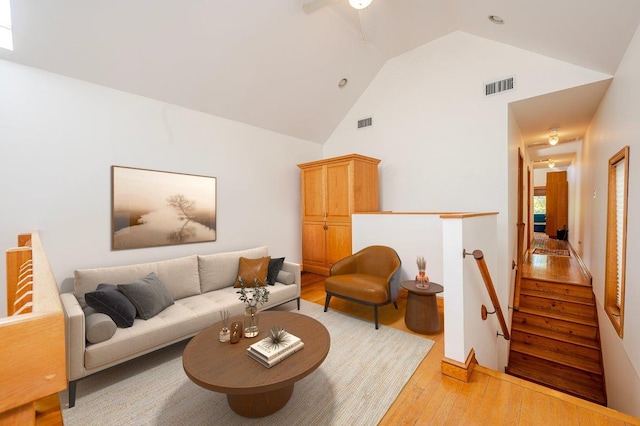 991 W Park Ave, Long Beach, NY 11561 - living area with light wood finished floors, high vaulted ceiling, and ceiling fan