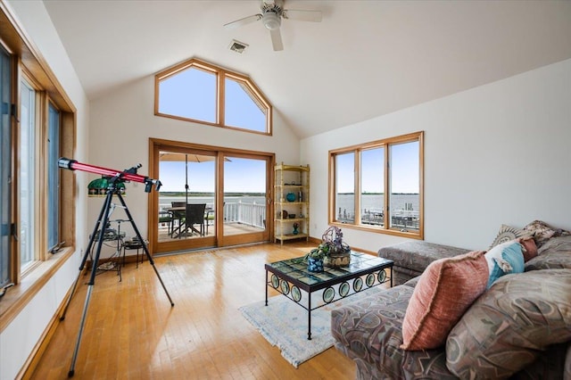 991 W Park Ave, Long Beach, NY 11561 - living area featuring a ceiling fan, vaulted ceiling, and hardwood / wood-style floors