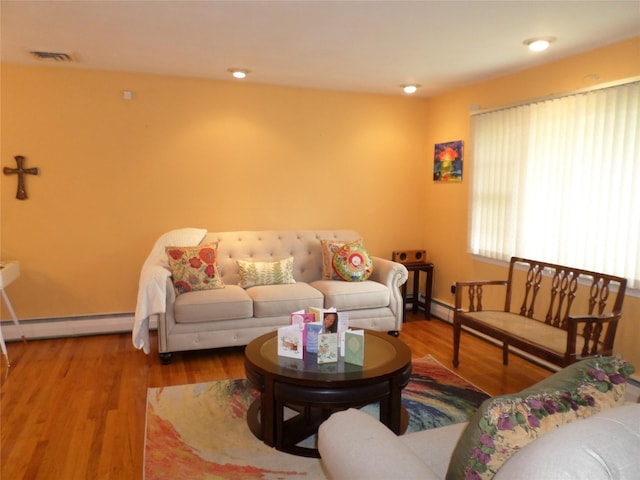 17 Johanna Ln, Monsey, NY 10952 - living room featuring a baseboard radiator and wood finished floors