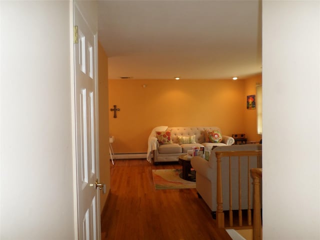 17 Johanna Ln, Monsey, NY 10952 - corridor with baseboard heating and wood finished floors