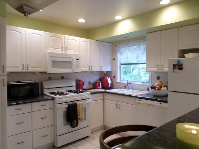 17 Johanna Ln, Monsey, NY 10952 - kitchen with white appliances, a sink, white cabinetry, backsplash, and light tile patterned floors