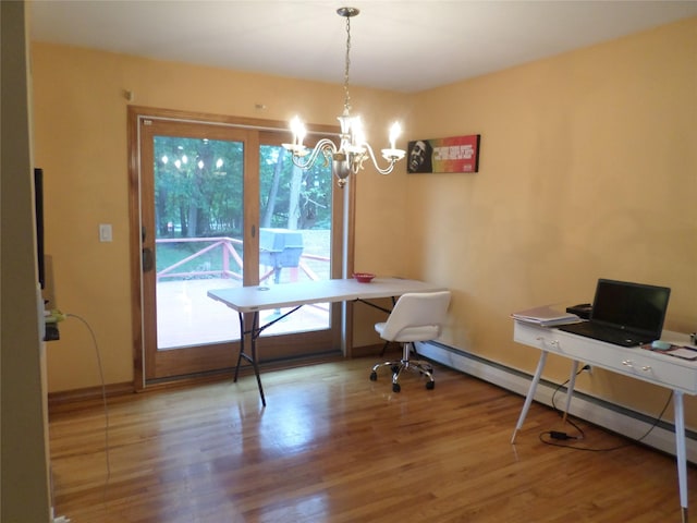 17 Johanna Ln, Monsey, NY 10952 - dining space with a chandelier, a desk, wood finished floors, and baseboards