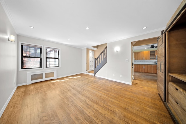 40-40 203rd St Unit 12B, Bayside, NY 11361 - unfurnished living room featuring stairway, ornamental molding, light wood finished floors, baseboards, and recessed lighting