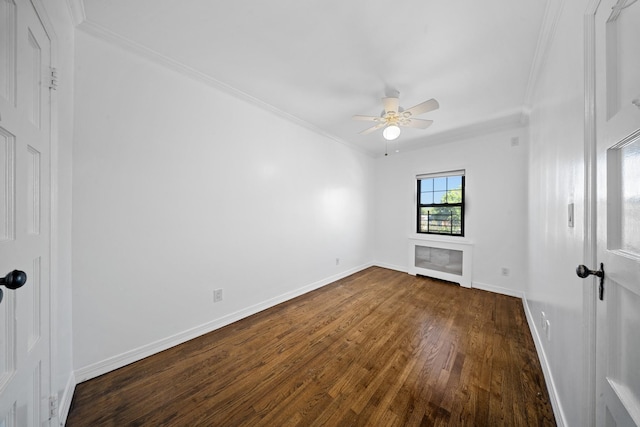 40-40 203rd St Unit 12B, Bayside, NY 11361 - unfurnished room with ornamental molding, dark wood finished floors, a ceiling fan, and baseboards