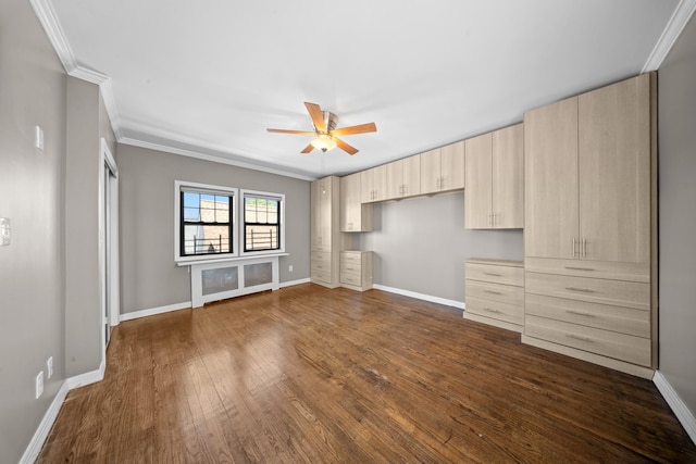 40-40 203rd St Unit 12B, Bayside, NY 11361 - unfurnished bedroom with dark wood-type flooring, crown molding, baseboards, and a ceiling fan
