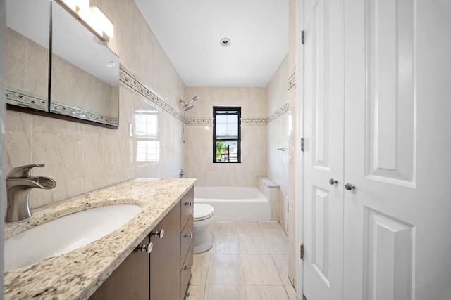 40-40 203rd St Unit 12B, Bayside, NY 11361 - bathroom featuring vanity, bathing tub / shower combination, toilet, tile walls, and tile patterned flooring