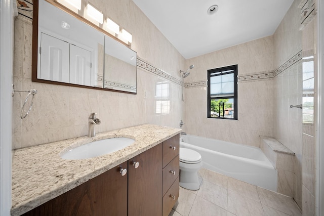 40-40 203rd St Unit 12B, Bayside, NY 11361 - bathroom featuring vanity, tile walls, toilet, shower / bath combination, and tile patterned flooring