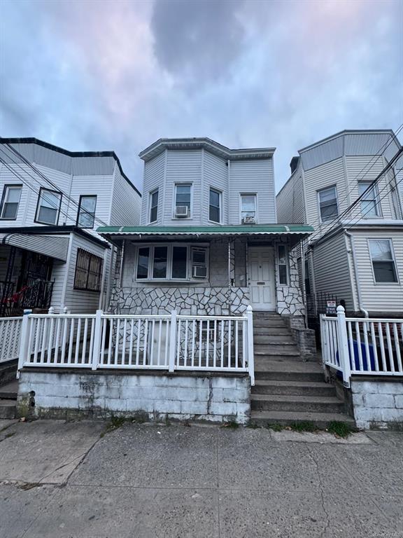 102-10 32nd Ave, East Elmhurst, NY 11369 - view of front of house featuring covered porch