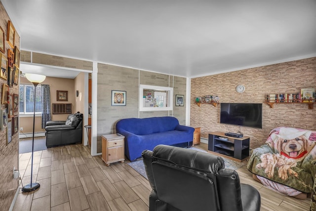 336 Auborn Ave, Shirley, NY 11967 - living area featuring a baseboard radiator, a wall mounted AC, wood finish floors, and baseboards