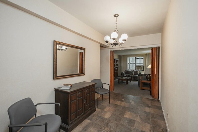 32-25 91st St Unit 209, East Elmhurst, NY 11369 - hallway featuring a chandelier, baseboards, dark stone finish flooring, and cooling unit