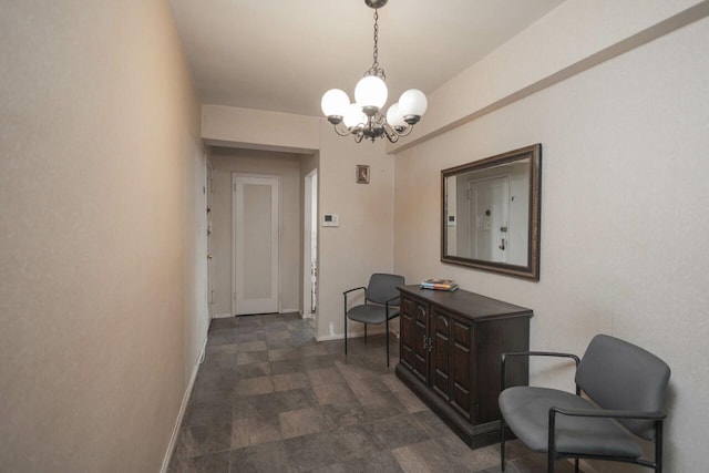32-25 91st St Unit 209, East Elmhurst, NY 11369 - hall with a chandelier, baseboards, and stone finish floors