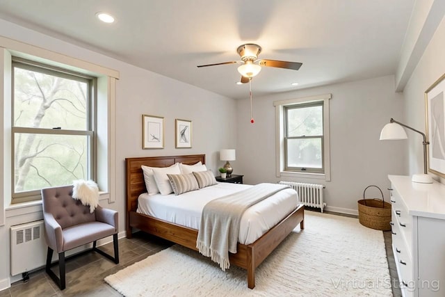 32-25 91st St Unit 209, East Elmhurst, NY 11369 - bedroom with radiator, recessed lighting, baseboards, and a ceiling fan