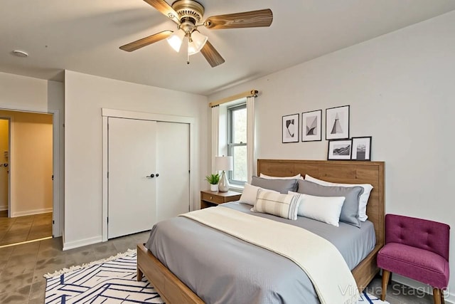 32-25 91st St Unit 209, East Elmhurst, NY 11369 - bedroom featuring a closet, a ceiling fan, and baseboards