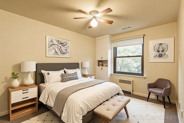 32-25 91st St Unit 209, East Elmhurst, NY 11369 - bedroom with radiator heating unit, baseboards, and ceiling fan