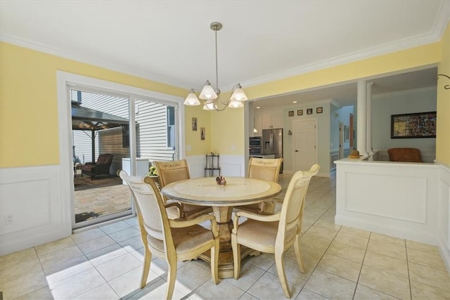 646 Rte 311, Patterson, NY 12563 - dining area featuring wainscoting, crown molding, a chandelier, and light tile patterned flooring