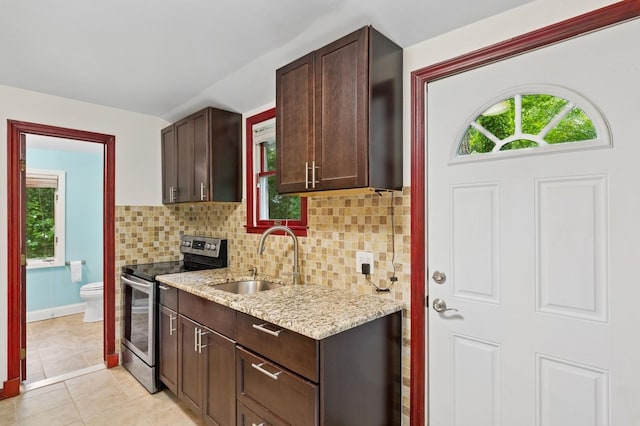 5 Murray Hill Rd, Sound Beach, NY 11789 - kitchen featuring stainless steel range with electric cooktop, a sink, backsplash, dark brown cabinetry, and lofted ceiling