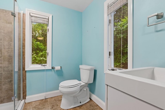 5 Murray Hill Rd, Sound Beach, NY 11789 - bathroom with baseboards, toilet, a shower stall, tile patterned flooring, and vanity