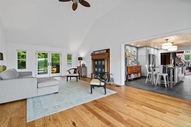 281 Hubert Rd, Jeffersonville, NY 12748 - living area with plenty of natural light, high vaulted ceiling, a ceiling fan, dark wood-style flooring, and french doors