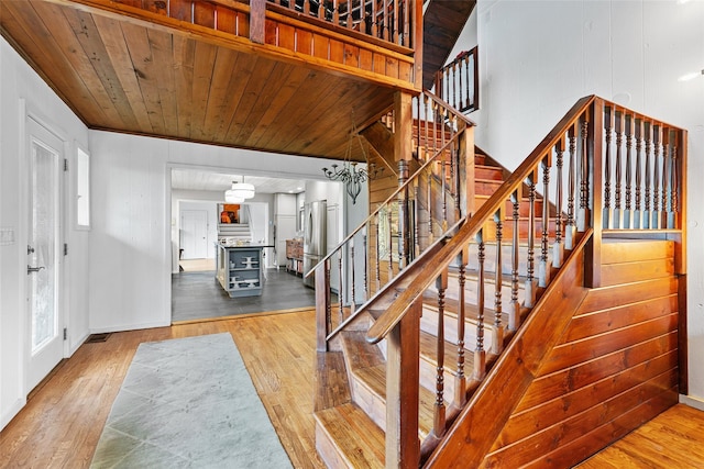 281 Hubert Rd, Jeffersonville, NY 12748 - staircase featuring wood finished floors, baseboards, and wooden ceiling