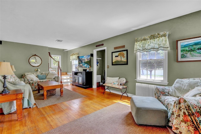 170 Little E Neck Rd S, Babylon, NY 11702 - living room featuring radiator and hardwood / wood-style floors