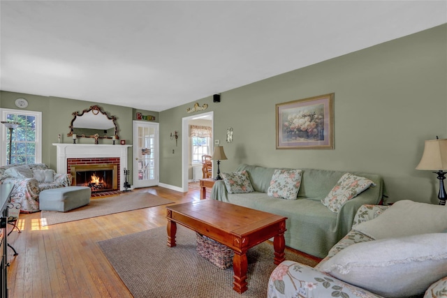 170 Little E Neck Rd S, Babylon, NY 11702 - living area with hardwood / wood-style floors, a fireplace, and baseboards