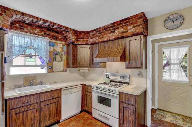 170 Little E Neck Rd S, Babylon, NY 11702 - kitchen with white appliances, a sink, light countertops, custom exhaust hood, and brown cabinets