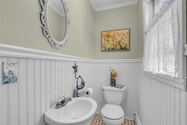 170 Little E Neck Rd S, Babylon, NY 11702 - bathroom with a sink, a wainscoted wall, toilet, baseboard heating, and healthy amount of natural light