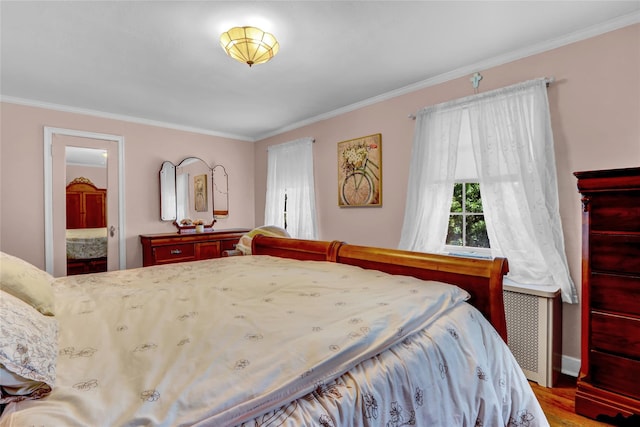 170 Little E Neck Rd S, Babylon, NY 11702 - bedroom featuring crown molding and wood finished floors