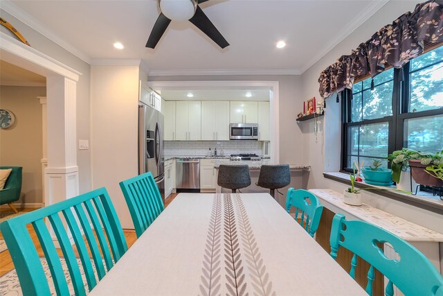 32 Manchester Rd Unit # B26, Eastchester, NY 10709 - dining room featuring a ceiling fan, ornamental molding, recessed lighting, and wood finished floors