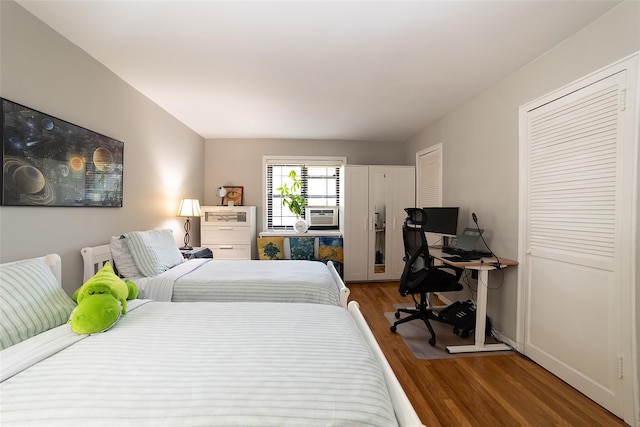 32 Manchester Rd Unit # B26, Eastchester, NY 10709 - bedroom featuring wood finished floors and multiple closets