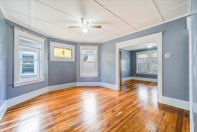 5 Gray Sts, Poughkeepsie, NY 12601 - empty room with wood-type flooring, healthy amount of natural light, crown molding, and baseboards
