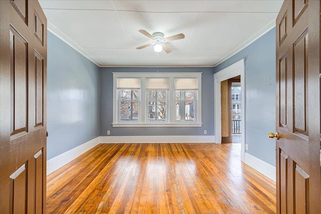 5 Gray Sts, Poughkeepsie, NY 12601 - spare room featuring a ceiling fan, light wood-style flooring, baseboards, and ornamental molding
